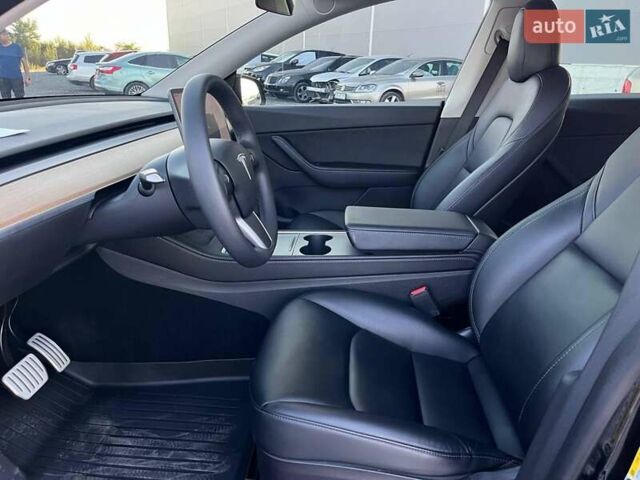 Черный Тесла Model Y, объемом двигателя 0 л и пробегом 73 тыс. км за 27890 $, фото 12 на Automoto.ua