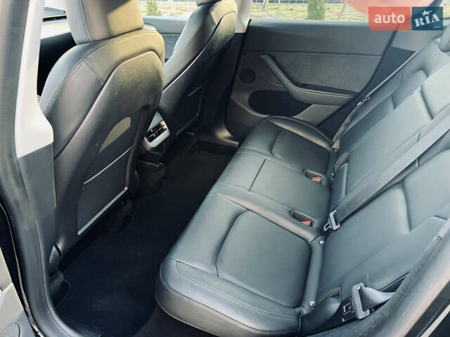 Черный Тесла Model Y, объемом двигателя 0 л и пробегом 100 тыс. км за 28900 $, фото 33 на Automoto.ua