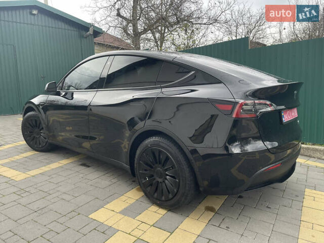 Черный Тесла Model Y, объемом двигателя 0 л и пробегом 67 тыс. км за 27500 $, фото 54 на Automoto.ua