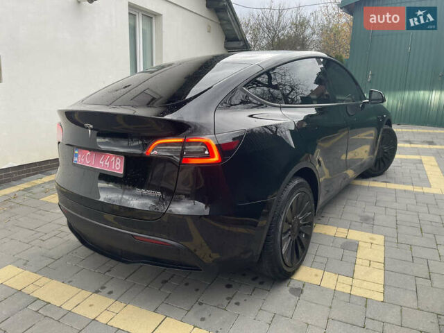 Черный Тесла Model Y, объемом двигателя 0 л и пробегом 67 тыс. км за 27500 $, фото 52 на Automoto.ua