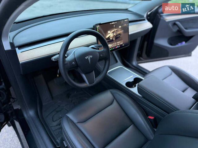 Черный Тесла Model Y, объемом двигателя 0 л и пробегом 53 тыс. км за 34999 $, фото 20 на Automoto.ua