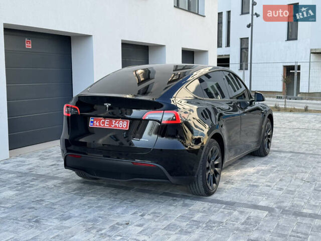 Черный Тесла Model Y, объемом двигателя 0 л и пробегом 48 тыс. км за 28999 $, фото 6 на Automoto.ua