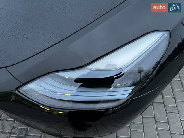 Черный Тесла Model Y, объемом двигателя 0 л и пробегом 85 тыс. км за 28000 $, фото 46 на Automoto.ua