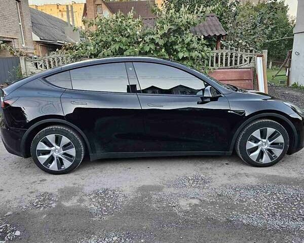 Черный Тесла Model Y, объемом двигателя 0 л и пробегом 54 тыс. км за 26300 $, фото 1 на Automoto.ua