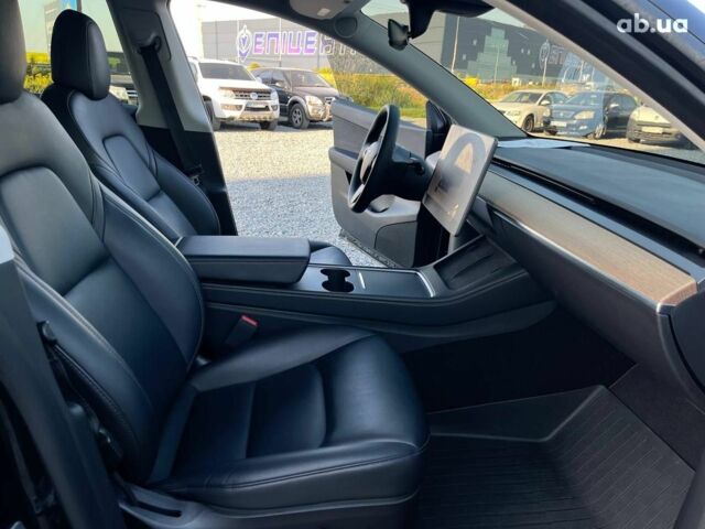 Черный Тесла Model Y, объемом двигателя 0 л и пробегом 73 тыс. км за 27890 $, фото 36 на Automoto.ua