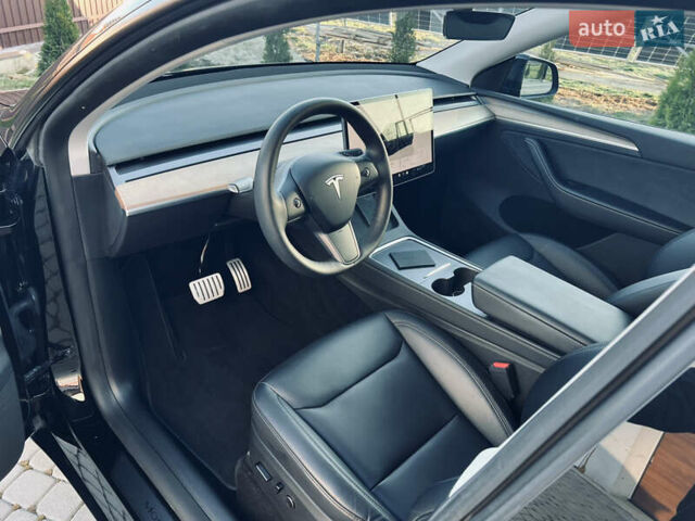 Черный Тесла Model Y, объемом двигателя 0 л и пробегом 100 тыс. км за 28900 $, фото 32 на Automoto.ua
