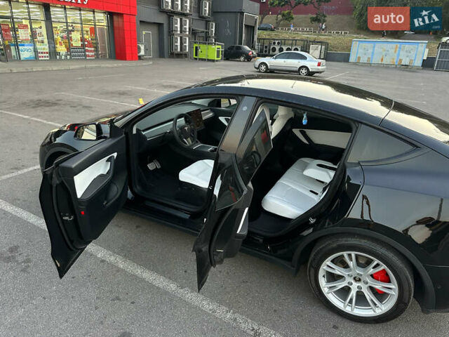 Чорний Тесла Model Y, об'ємом двигуна 0 л та пробігом 135 тис. км за 26499 $, фото 25 на Automoto.ua