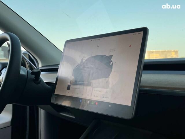 Черный Тесла Model Y, объемом двигателя 0 л и пробегом 73 тыс. км за 27890 $, фото 42 на Automoto.ua