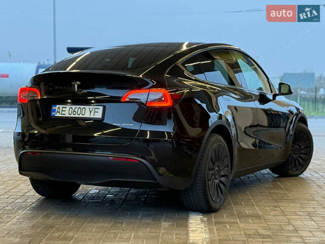 Черный Тесла Model Y, объемом двигателя 0 л и пробегом 53 тыс. км за 34999 $, фото 5 на Automoto.ua