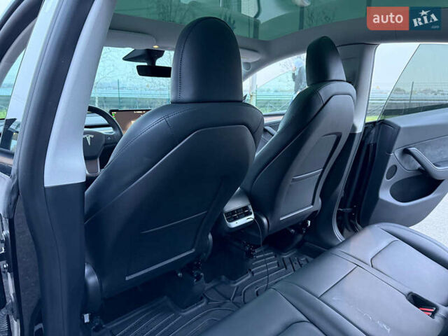 Черный Тесла Model Y, объемом двигателя 0 л и пробегом 53 тыс. км за 34999 $, фото 22 на Automoto.ua