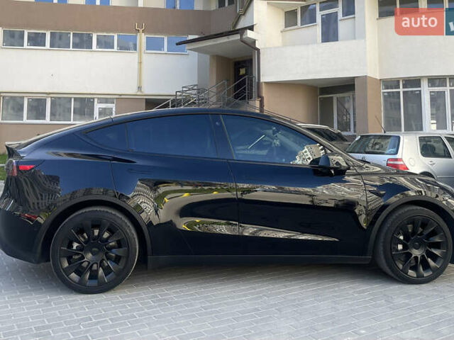 Черный Тесла Model Y, объемом двигателя 0 л и пробегом 81 тыс. км за 27700 $, фото 1 на Automoto.ua