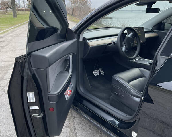 Чорний Тесла Model Y, об'ємом двигуна 0 л та пробігом 88 тис. км за 29999 $, фото 11 на Automoto.ua