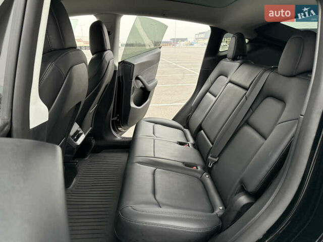Черный Тесла Model Y, объемом двигателя 0 л и пробегом 22 тыс. км за 27999 $, фото 23 на Automoto.ua