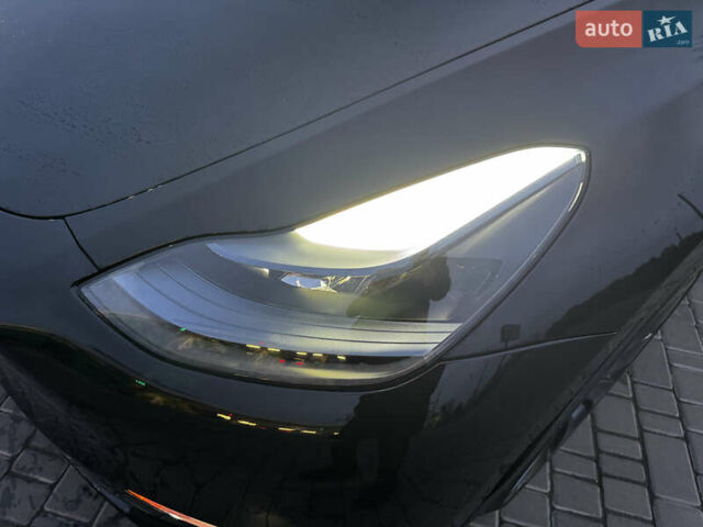 Черный Тесла Model Y, объемом двигателя 0 л и пробегом 85 тыс. км за 28000 $, фото 47 на Automoto.ua