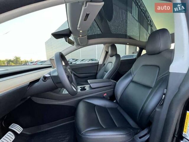 Черный Тесла Model Y, объемом двигателя 0 л и пробегом 73 тыс. км за 27890 $, фото 15 на Automoto.ua