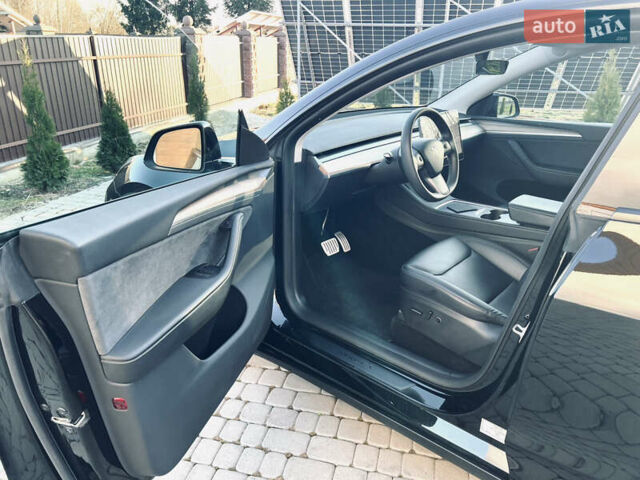 Черный Тесла Model Y, объемом двигателя 0 л и пробегом 100 тыс. км за 28900 $, фото 29 на Automoto.ua