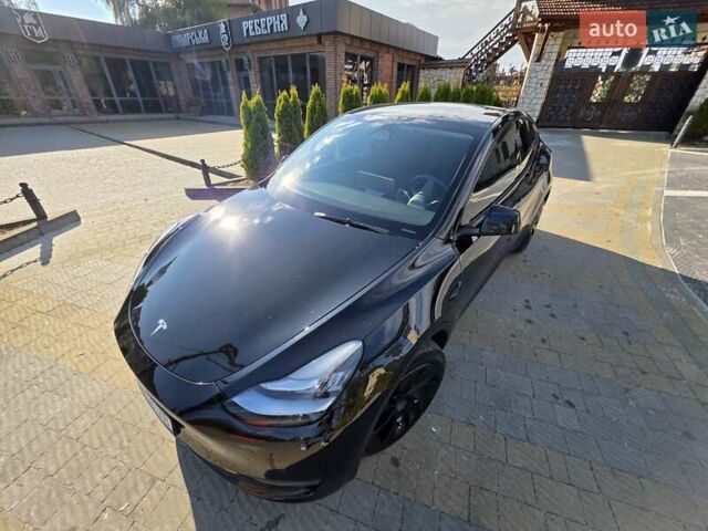 Черный Тесла Model Y, объемом двигателя 0 л и пробегом 27 тыс. км за 28999 $, фото 10 на Automoto.ua