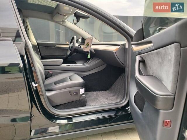 Черный Тесла Model Y, объемом двигателя 0 л и пробегом 23 тыс. км за 30500 $, фото 25 на Automoto.ua