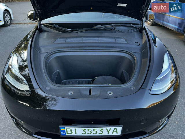 Черный Тесла Model Y, объемом двигателя 0 л и пробегом 83 тыс. км за 30000 $, фото 10 на Automoto.ua