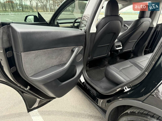 Черный Тесла Model Y, объемом двигателя 0 л и пробегом 22 тыс. км за 27999 $, фото 19 на Automoto.ua