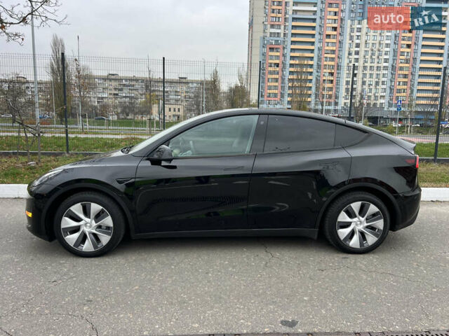 Черный Тесла Model Y, объемом двигателя 0 л и пробегом 61 тыс. км за 22900 $, фото 4 на Automoto.ua