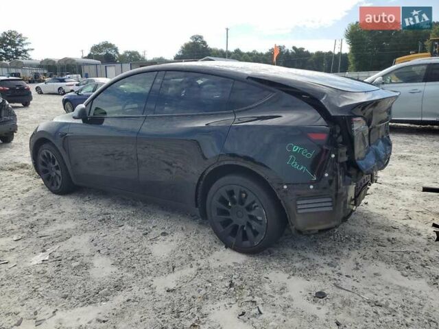 Чорний Тесла Model Y, об'ємом двигуна 0 л та пробігом 102 тис. км за 19000 $, фото 1 на Automoto.ua