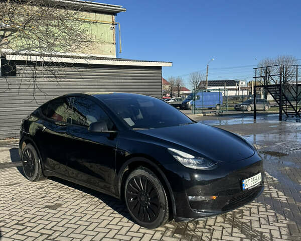 Черный Тесла Model Y, объемом двигателя 0 л и пробегом 51 тыс. км за 23200 $, фото 2 на Automoto.ua