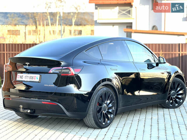 Черный Тесла Model Y, объемом двигателя 0 л и пробегом 100 тыс. км за 28900 $, фото 23 на Automoto.ua