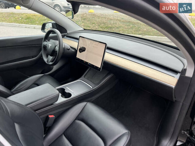 Черный Тесла Model Y, объемом двигателя 0 л и пробегом 61 тыс. км за 22900 $, фото 24 на Automoto.ua