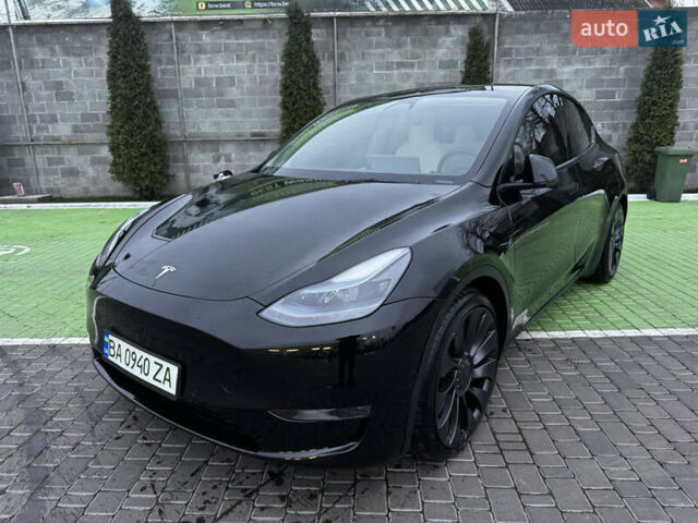 Черный Тесла Model Y, объемом двигателя 0 л и пробегом 85 тыс. км за 28000 $, фото 2 на Automoto.ua