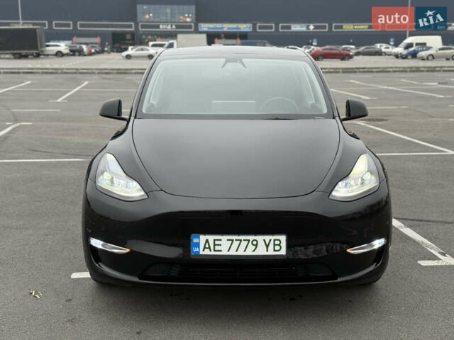 Черный Тесла Model Y, объемом двигателя 0 л и пробегом 22 тыс. км за 27999 $, фото 4 на Automoto.ua