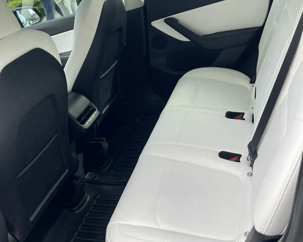 Черный Тесла Model Y, объемом двигателя 0 л и пробегом 89 тыс. км за 26999 $, фото 23 на Automoto.ua
