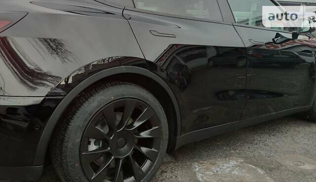 Черный Тесла Model Y, объемом двигателя 0 л и пробегом 12 тыс. км за 39999 $, фото 15 на Automoto.ua