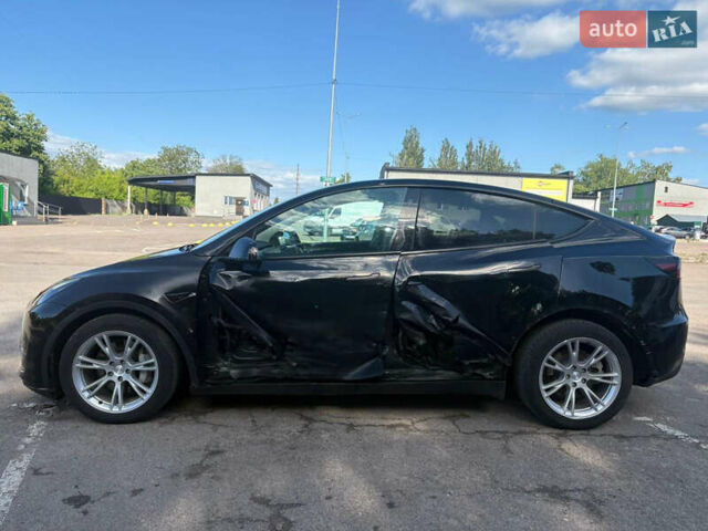 Черный Тесла Model Y, объемом двигателя 0 л и пробегом 51 тыс. км за 23699 $, фото 4 на Automoto.ua