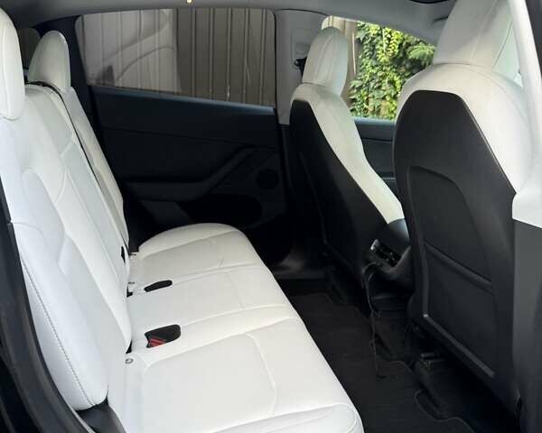 Черный Тесла Model Y, объемом двигателя 0 л и пробегом 90 тыс. км за 32000 $, фото 18 на Automoto.ua