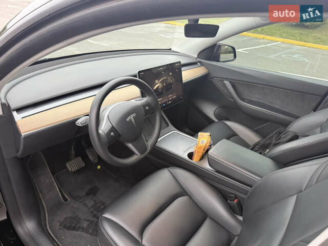 Черный Тесла Model Y, объемом двигателя 0 л и пробегом 65 тыс. км за 27000 $, фото 11 на Automoto.ua