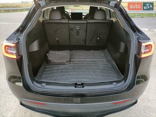 Черный Тесла Model Y, объемом двигателя 0 л и пробегом 52 тыс. км за 26300 $, фото 16 на Automoto.ua
