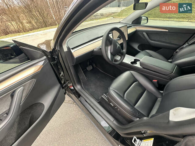 Черный Тесла Model Y, объемом двигателя 0 л и пробегом 24 тыс. км за 27999 $, фото 12 на Automoto.ua