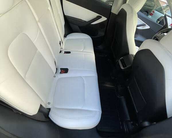 Черный Тесла Model Y, объемом двигателя 0 л и пробегом 81 тыс. км за 27700 $, фото 17 на Automoto.ua