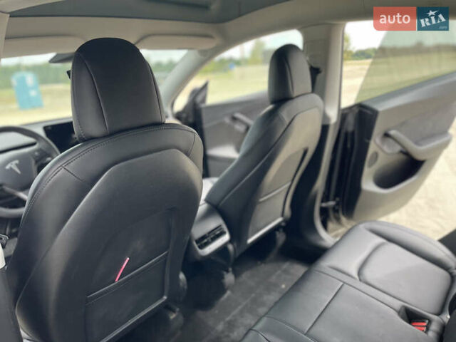Черный Тесла Model Y, объемом двигателя 0 л и пробегом 83 тыс. км за 25500 $, фото 24 на Automoto.ua