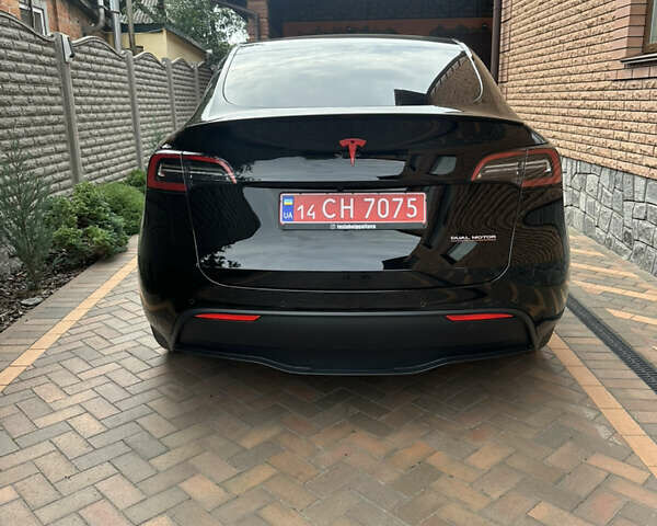 Черный Тесла Model Y, объемом двигателя 0 л и пробегом 56 тыс. км за 27000 $, фото 3 на Automoto.ua