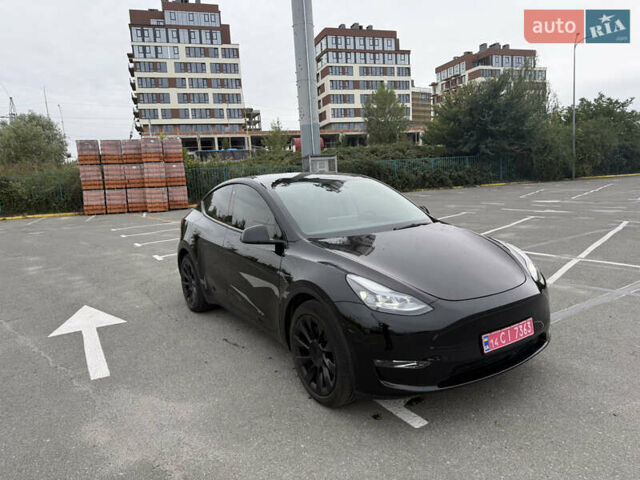 Черный Тесла Model Y, объемом двигателя 0 л и пробегом 65 тыс. км за 27000 $, фото 2 на Automoto.ua