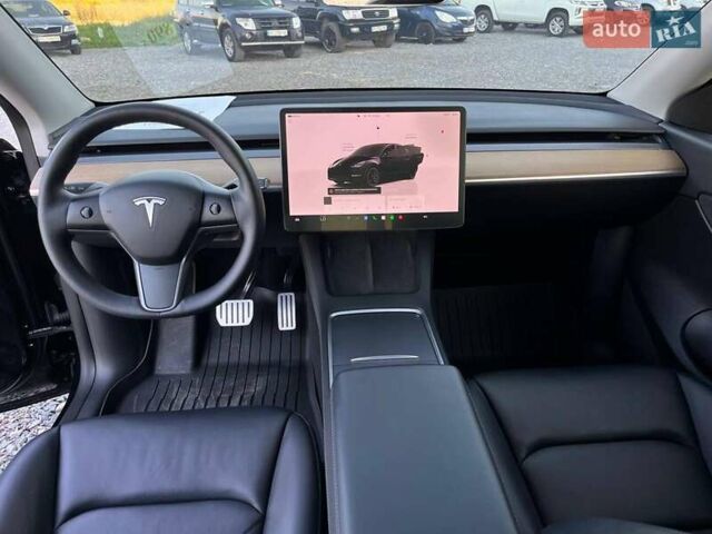 Черный Тесла Model Y, объемом двигателя 0 л и пробегом 73 тыс. км за 27890 $, фото 26 на Automoto.ua
