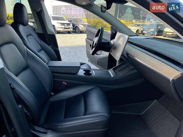 Черный Тесла Model Y, объемом двигателя 0 л и пробегом 73 тыс. км за 27890 $, фото 36 на Automoto.ua