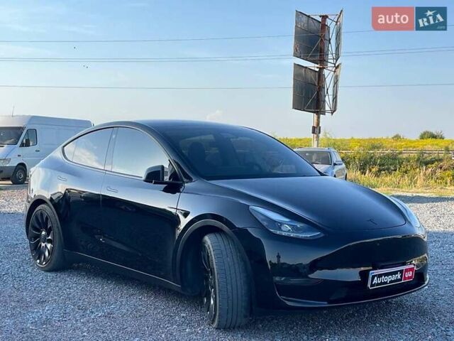 Черный Тесла Model Y, объемом двигателя 0 л и пробегом 73 тыс. км за 27890 $, фото 2 на Automoto.ua