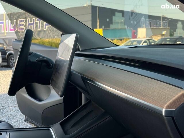 Черный Тесла Model Y, объемом двигателя 0 л и пробегом 73 тыс. км за 27890 $, фото 44 на Automoto.ua