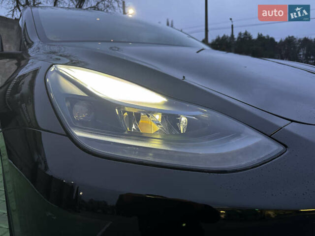 Черный Тесла Model Y, объемом двигателя 0 л и пробегом 85 тыс. км за 28000 $, фото 45 на Automoto.ua