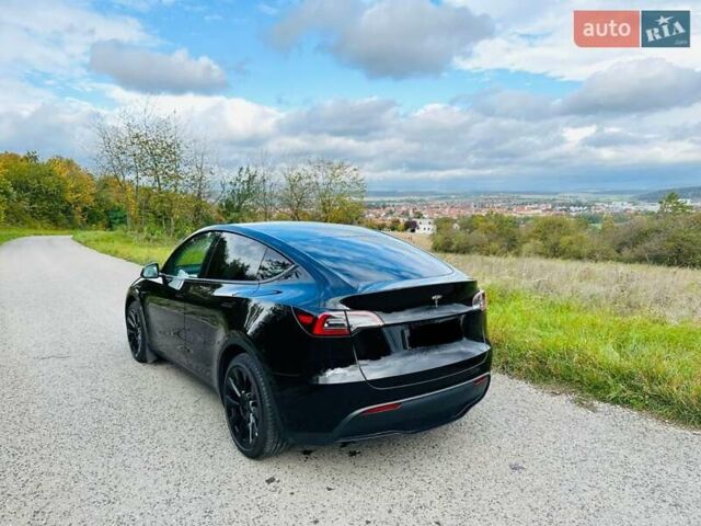 Черный Тесла Model Y, объемом двигателя 0 л и пробегом 10 тыс. км за 28999 $, фото 2 на Automoto.ua