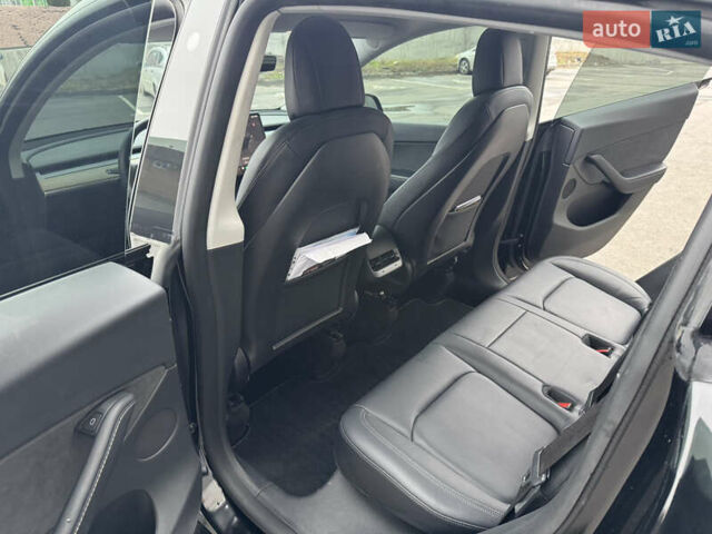 Черный Тесла Model Y, объемом двигателя 0 л и пробегом 68 тыс. км за 25000 $, фото 11 на Automoto.ua
