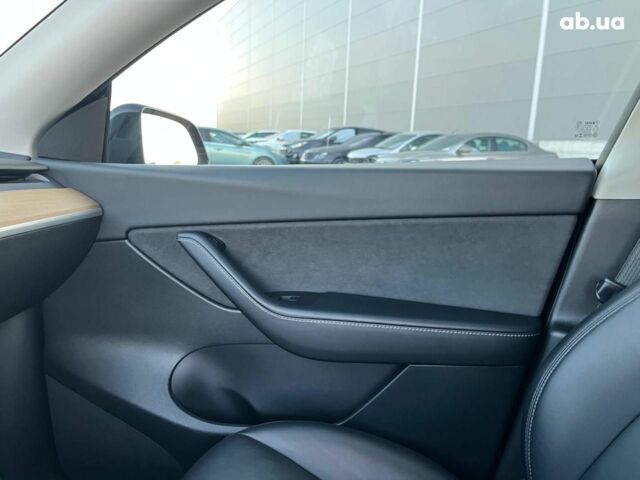 Черный Тесла Model Y, объемом двигателя 0 л и пробегом 73 тыс. км за 27890 $, фото 23 на Automoto.ua